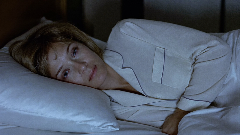 Woman lying awake at night